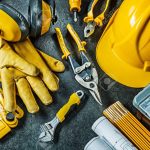 set of construction tools on black background